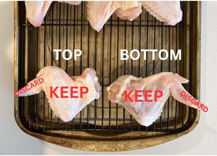 raw chicken wings on rack with wording to clip wings